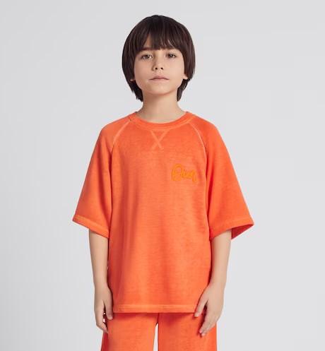 Children's T-shirt.  Orange cotton blended plain cloth.  Numbering: 3WBM23TEEF_Y720