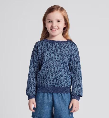 Children's sweater.  The color and color Dior Oblique flowers are mixed with the gold line.  Numbering: 3WBM14PULC_Y38I